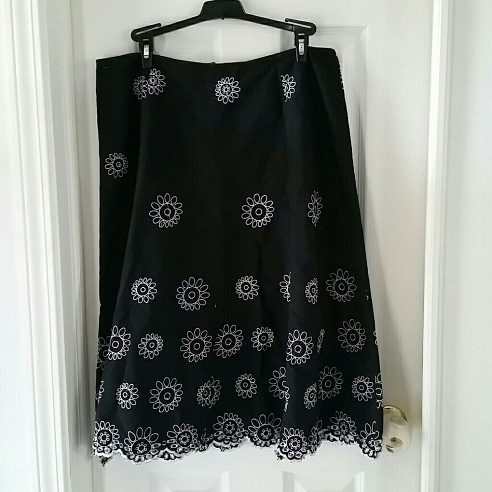 Knee length, black skirt with embroidery